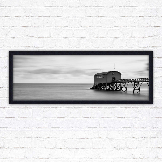 Lifeboat station at sea. Panoramic framed picture print. Black and white image. A choice of picture frames.