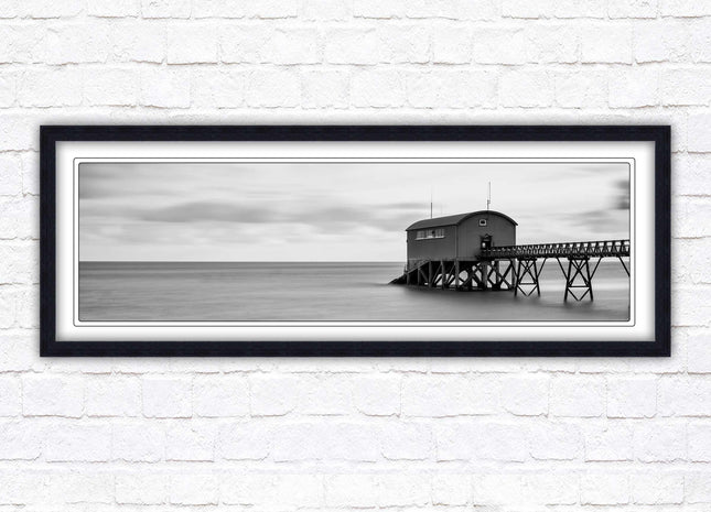 Lifeboat station at sea. Panoramic framed picture print. Black and white image. A choice of picture frames.
