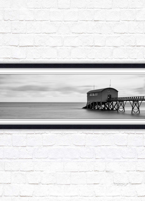 Lifeboat station at sea. Panoramic framed picture print. Black and white image. A choice of picture frames.