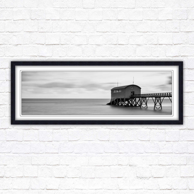 Lifeboat station at sea. Panoramic framed picture print. Black and white image. A choice of picture frames.