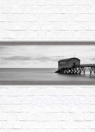 Lifeboat station at sea. Panoramic framed picture print. Black and white image. A choice of picture frames.