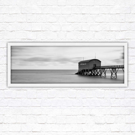 Lifeboat station at sea. Panoramic framed picture print. Black and white image. A choice of picture frames.