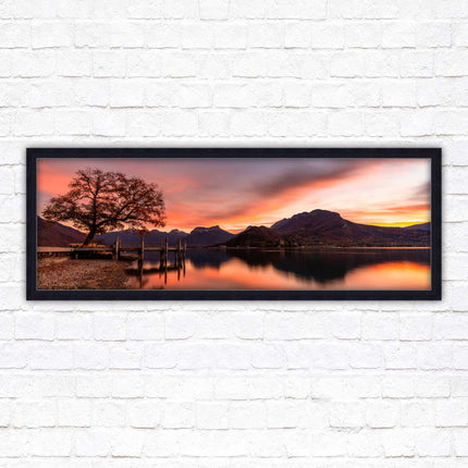 Sunset across the lake. Panoramic framed in a picture frame with choice of colours