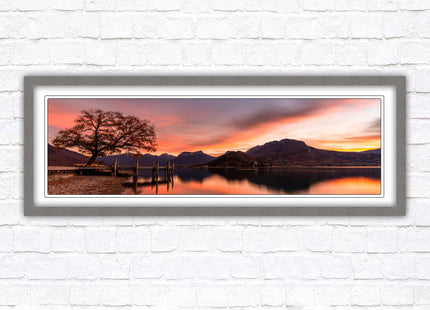 Sunset across the lake. Panoramic framed in a picture frame with choice of colours