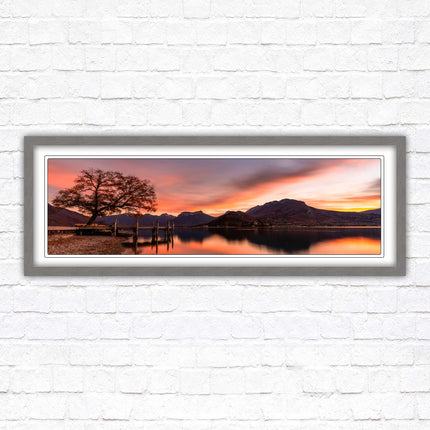 Sunset across the lake. Panoramic framed in a picture frame with choice of colours