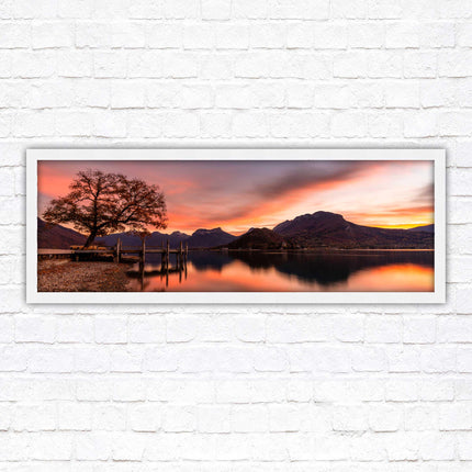 Sunset across the lake. Panoramic framed in a picture frame with choice of colours