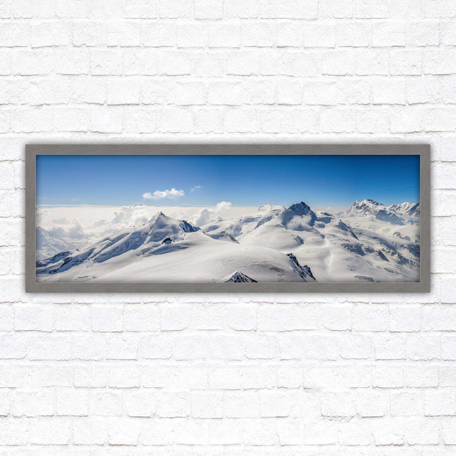 Swiss Alps mountain landscape. Panoramic framed picture print. Vibrant blue and white image. Choice of frame colours.