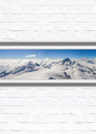 Swiss Alps mountain landscape. Panoramic framed picture print. Vibrant blue and white image. Choice of frame colours.