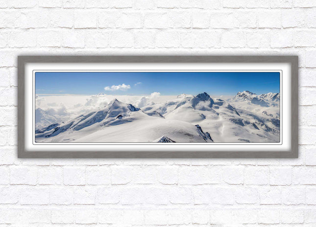 Swiss Alps mountain landscape. Panoramic framed picture print. Vibrant blue and white image. Choice of frame colours.