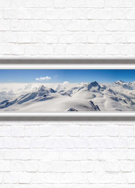 Swiss Alps mountain landscape. Panoramic framed picture print. Vibrant blue and white image. Choice of frame colours.