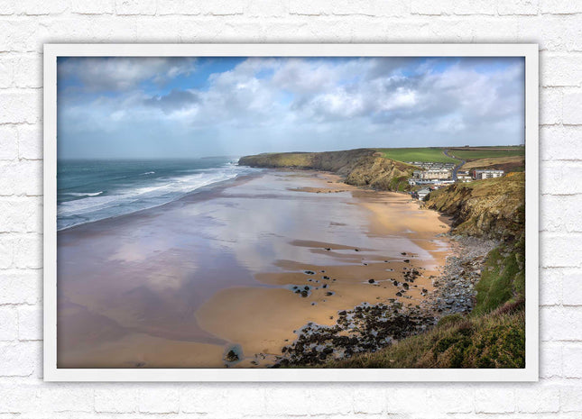 Watergate Bay on a winters day. Cornwall. Framed picture print with choice of frame colours
