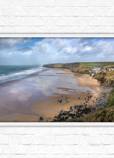 Watergate Bay on a winters day. Cornwall. Framed picture print with choice of frame colours