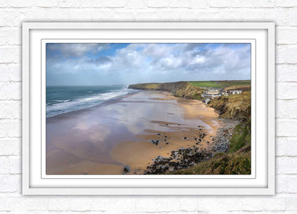 Watergate Bay on a winters day. Cornwall. Framed picture print with choice of frame colours