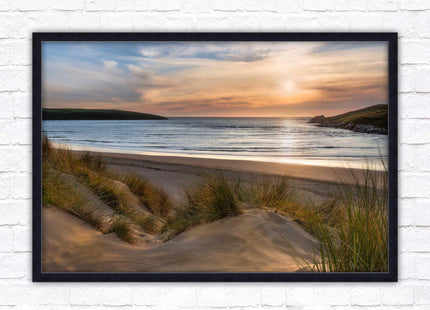 Crantock Beach. Sunlight over the sand dunes, North Cornwall coast. Framed picture print with choice of frame colours