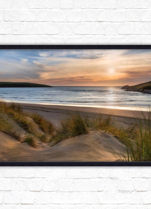 Crantock Beach. Sunlight over the sand dunes, North Cornwall coast. Framed picture print with choice of frame colours