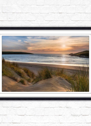 Crantock Beach. Sunlight over the sand dunes, North Cornwall coast. Framed picture print with choice of frame colours