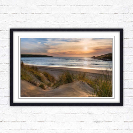 Crantock Beach. Sunlight over the sand dunes, North Cornwall coast. Framed picture print with choice of frame colours