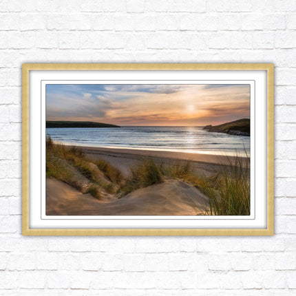 Crantock Beach. Sunlight over the sand dunes, North Cornwall coast. Framed picture print with choice of frame colours