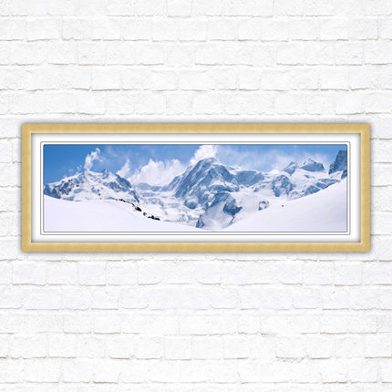 Swiss Alps mountain range. Panoramic framed picture print. Vibrant blue and white image. Choice of frame colours.