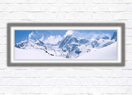 Swiss Alps mountain range. Panoramic framed picture print. Vibrant blue and white image. Choice of frame colours.