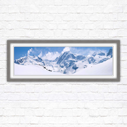 Swiss Alps mountain range. Panoramic framed picture print. Vibrant blue and white image. Choice of frame colours.
