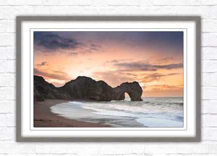 Durdle Door at sunset. Jurassic coast, Dorset. Framed picture print with choice of frame colours