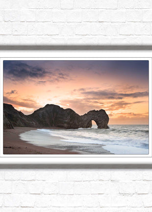 Durdle Door at sunset. Jurassic coast, Dorset. Framed picture print with choice of frame colours