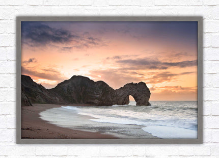 Durdle Door at sunset. Jurassic coast, Dorset. Framed picture print with choice of frame colours