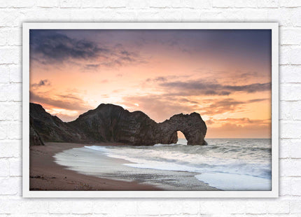 Durdle Door at sunset. Jurassic coast, Dorset. Framed picture print with choice of frame colours