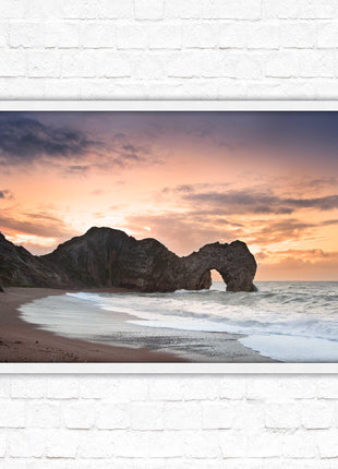Durdle Door at sunset. Jurassic coast, Dorset. Framed picture print with choice of frame colours