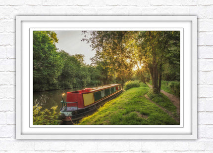 Barge on the canal. Peaceful countryside scenery. Framed picture print with a choice of frame colours.