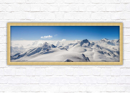 Swiss Alps mountain landscape. Panoramic framed picture print. Vibrant blue and white image. Choice of frame colours.