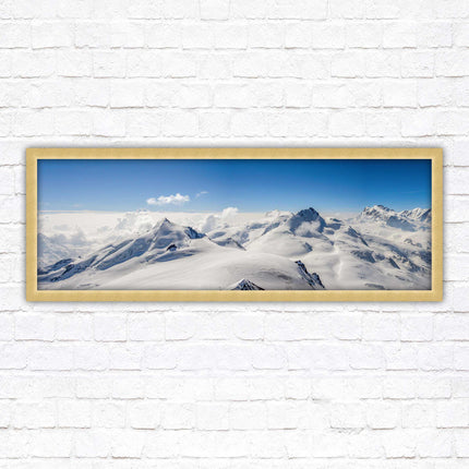 Swiss Alps mountain landscape. Panoramic framed picture print. Vibrant blue and white image. Choice of frame colours.